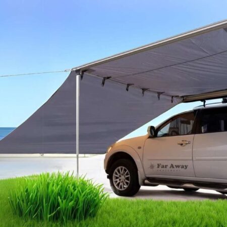 Szara markiza Far Away Equipment Classic z dodatkową ścianą boczną nad morzem