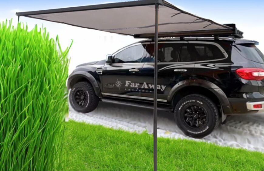markiza-samochodowa-alu-one-250-rozlozona-przy-suv